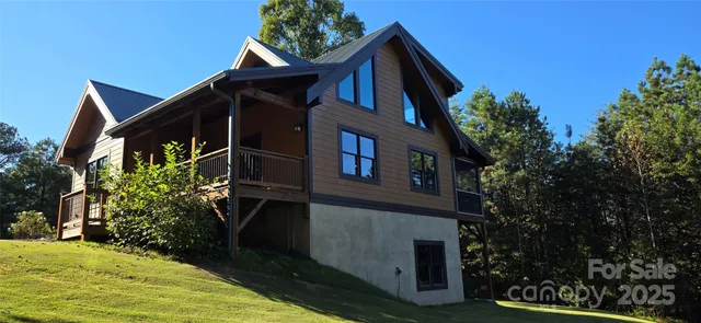 a backyard of a house with plants and trees