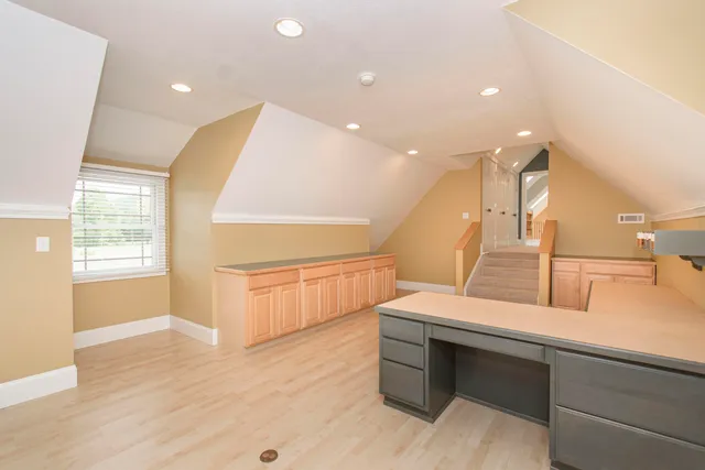 a view of a town with mountains in the background