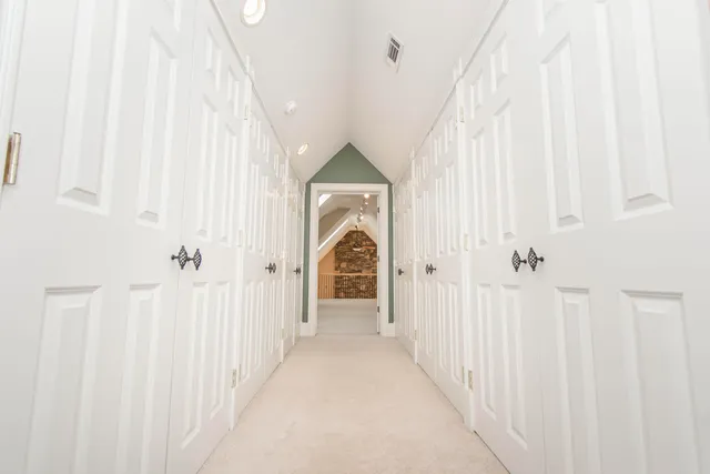 a view of a lake with a yard