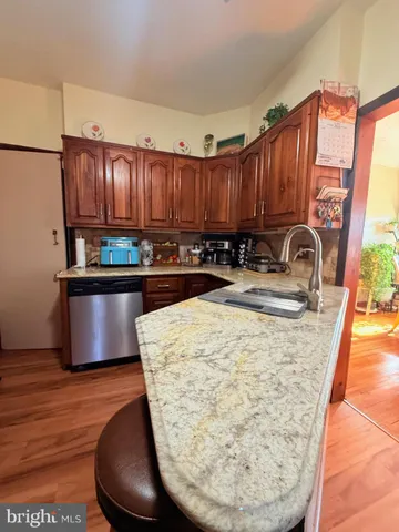 a view of a hallway with staircase