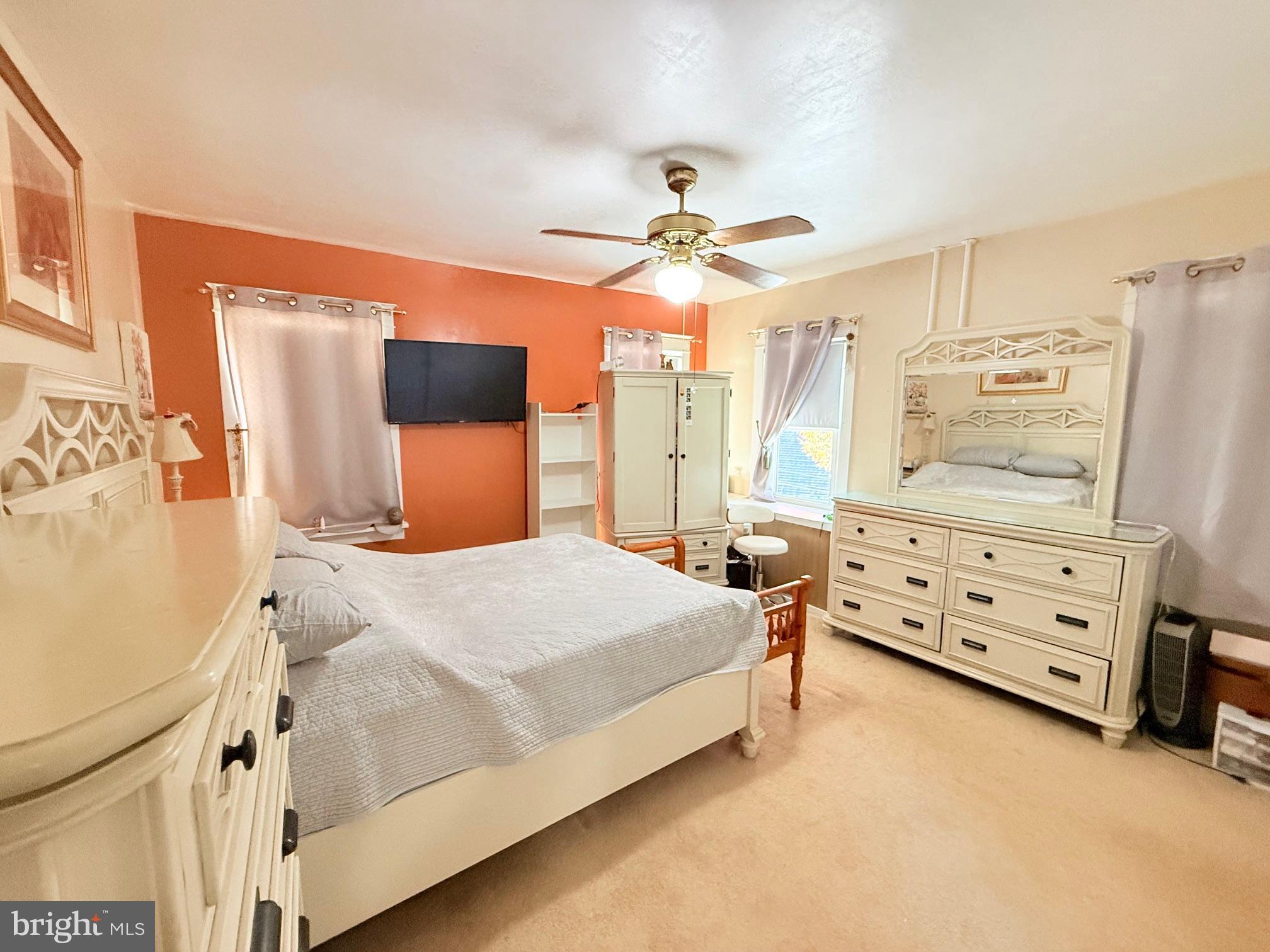 1200 Hampden Boulevard Reading, PA 19604 - Photo 18 of 32 a bedroom with a bed and a chandelier