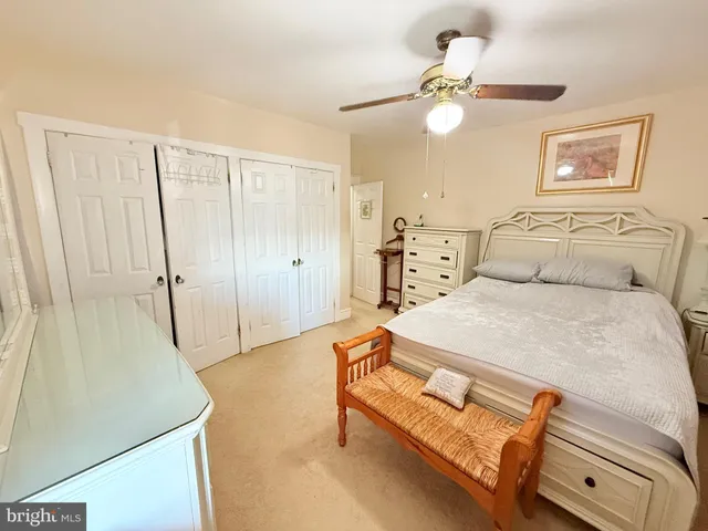 a bathroom with a sink a mirror and a shower