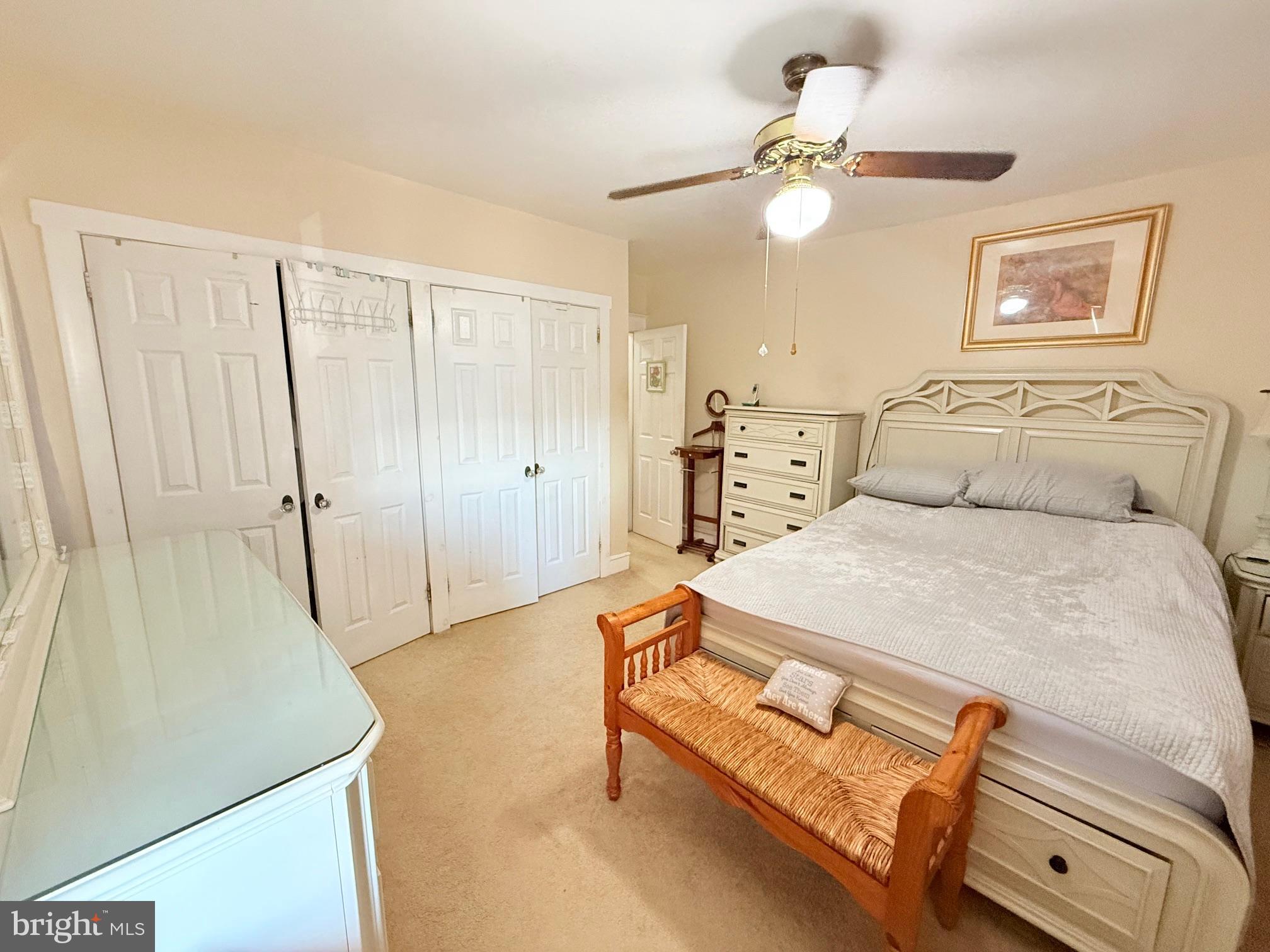 1200 Hampden Boulevard Reading, PA 19604 - Photo 19 of 32 a bedroom with a bed and a chandelier