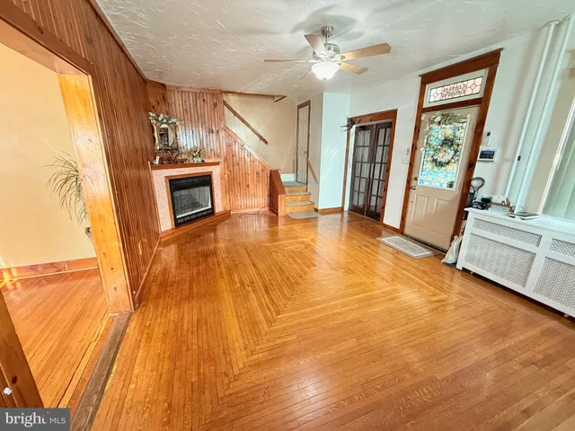a view of a livingroom with wooden floor