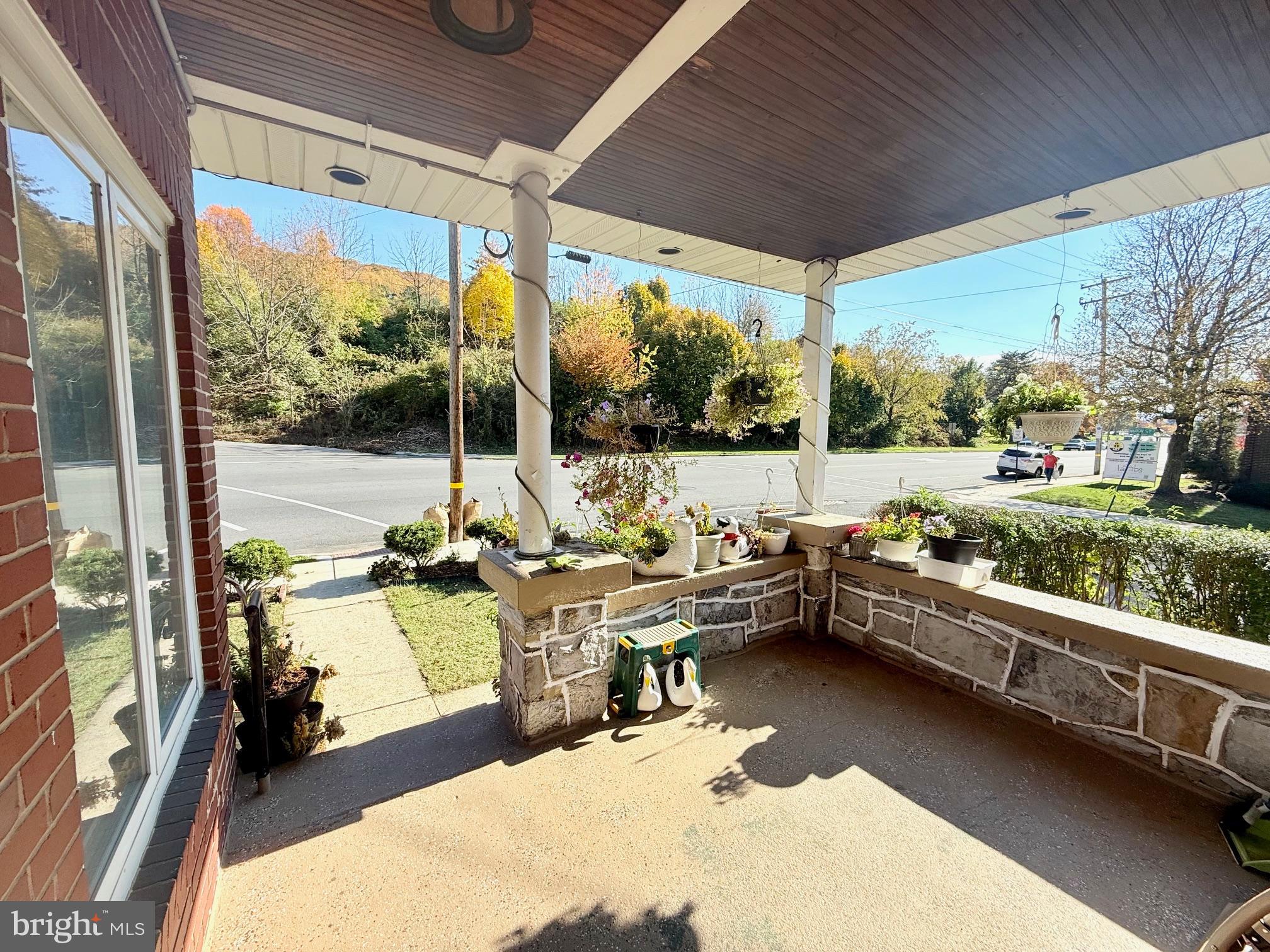 1200 Hampden Boulevard Reading, PA 19604 - Photo 7 of 32 a room with patio furniture and a floor to ceiling window