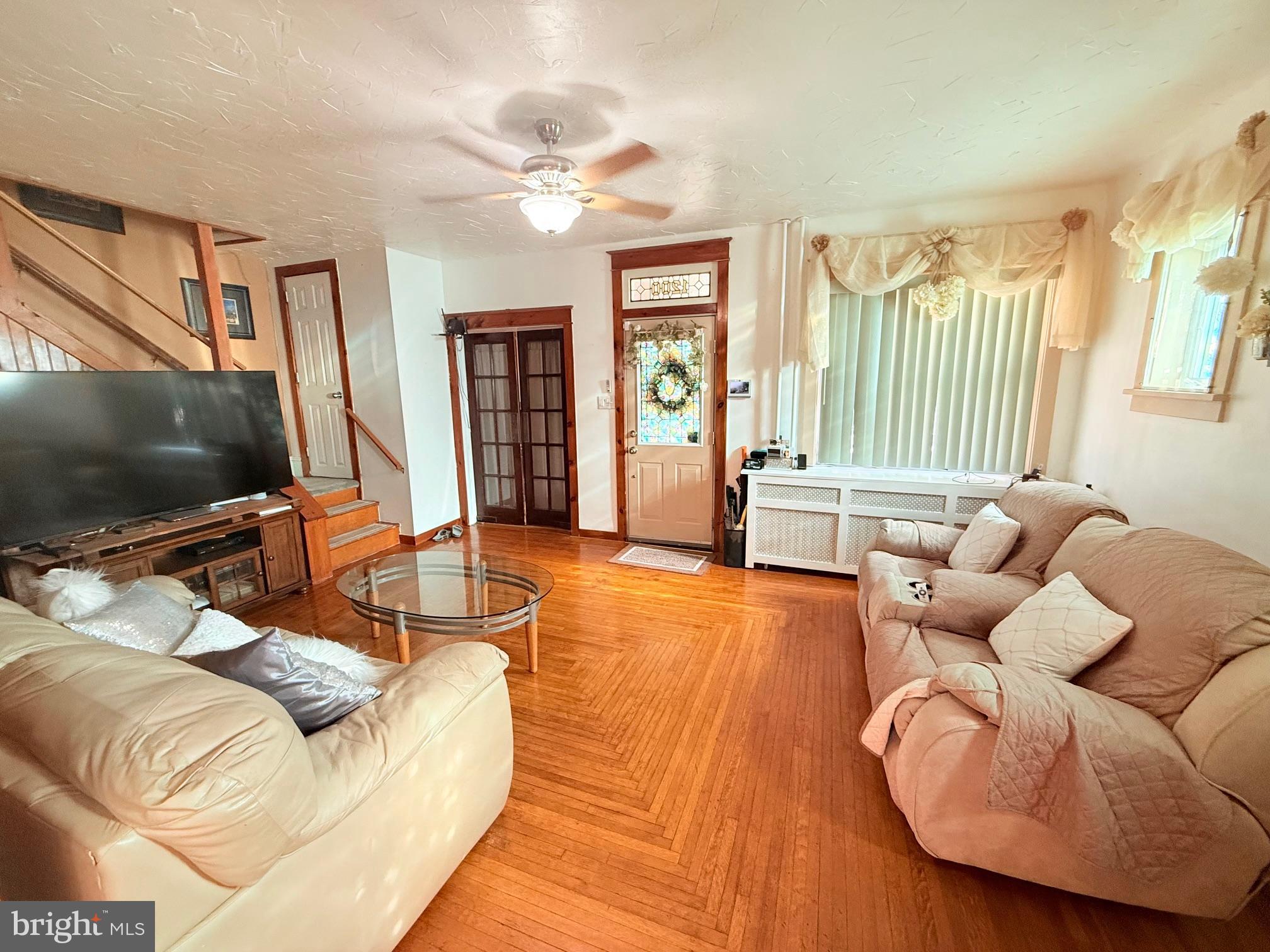 1200 Hampden Boulevard Reading, PA 19604 - Photo 9 of 32 a living room with furniture and a flat screen tv