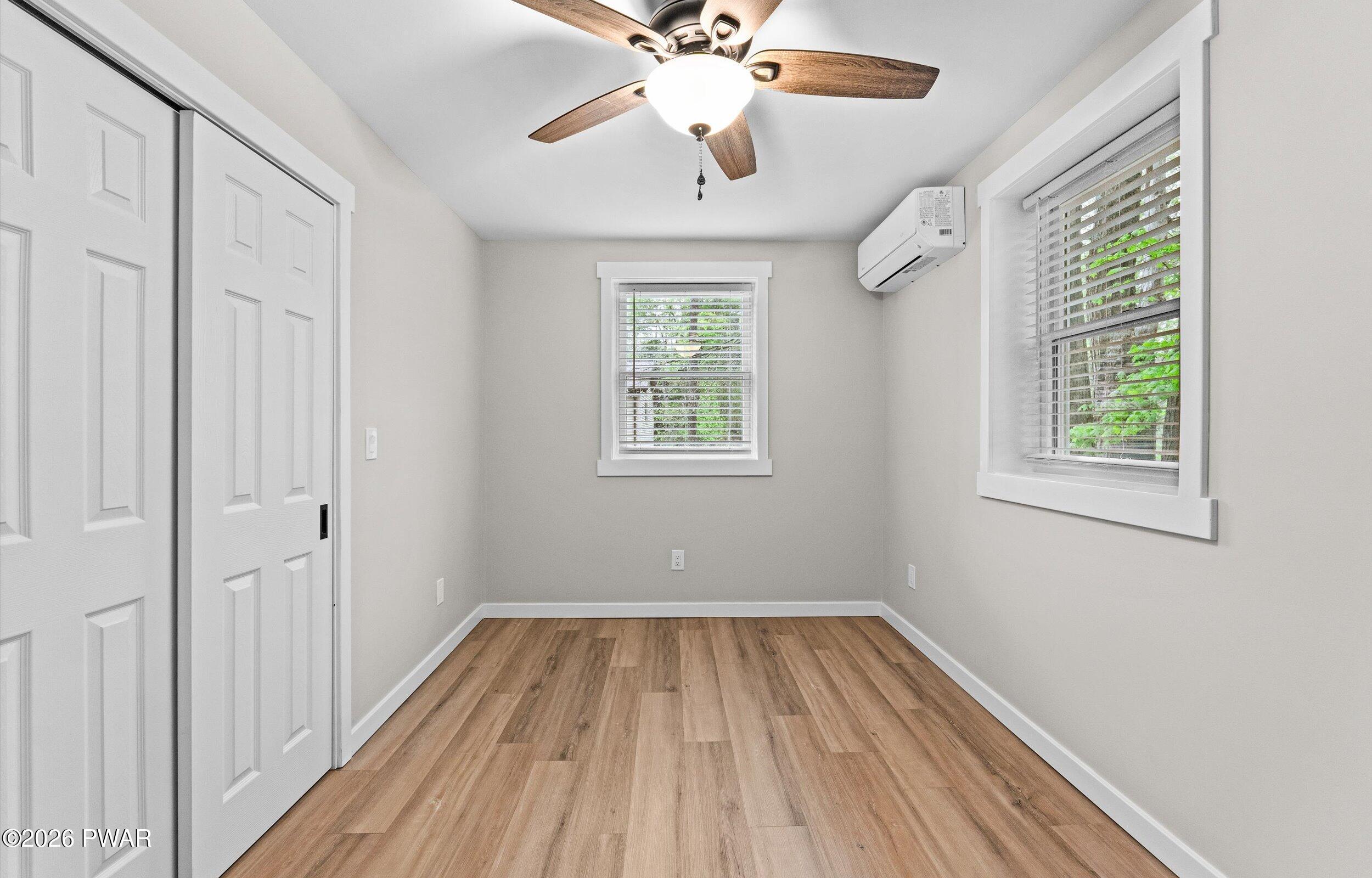 9 High Point Court Lake Ariel, PA 18436 - Photo 22 of 40 a view of room with window ceiling fan and hardwood floor