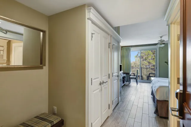 a view of a livingroom with furniture and hardwood floor