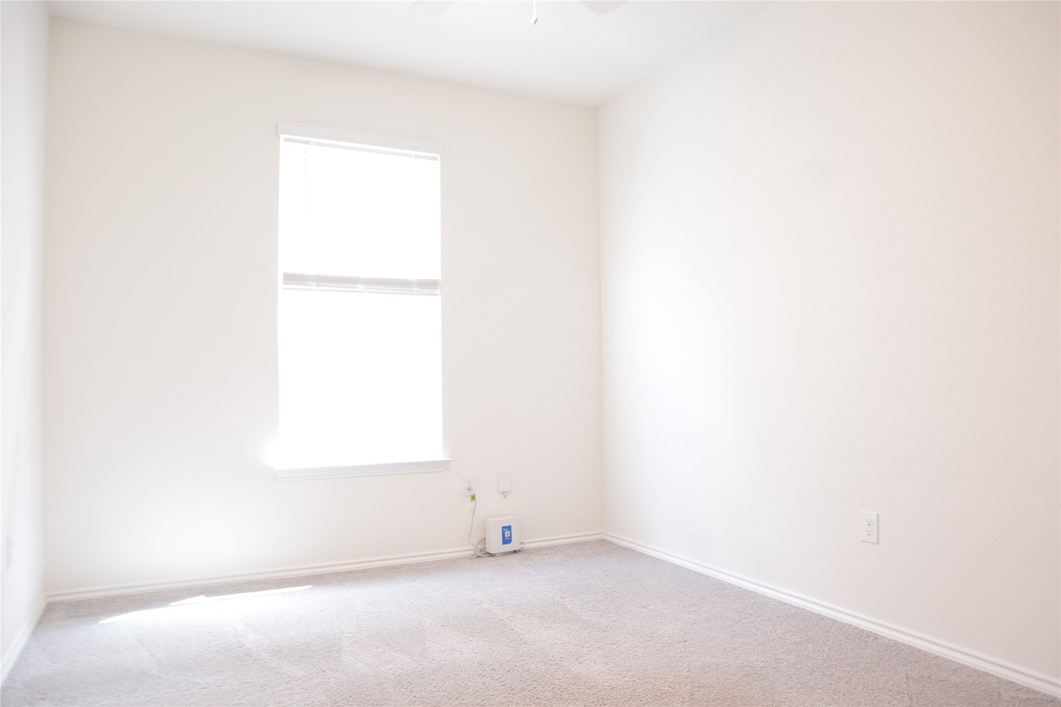 8111 Marigny Way Austin, TX 78744 - Photo 7 of 29 A quiet, naturally illuminated bedroom space awaits your personal touch.