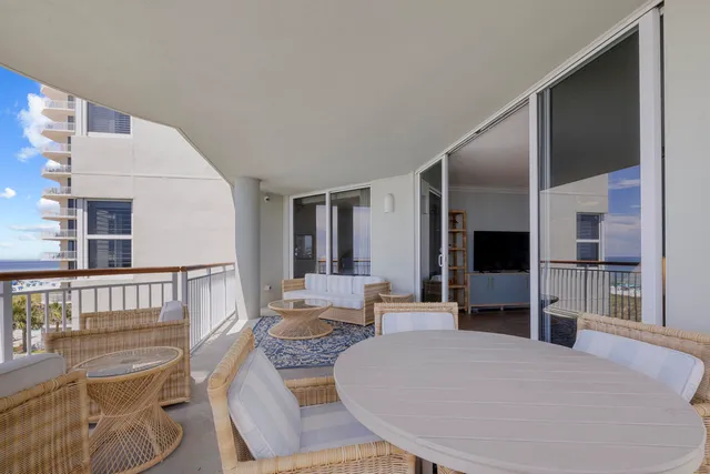 a living room with furniture and flat screen tv