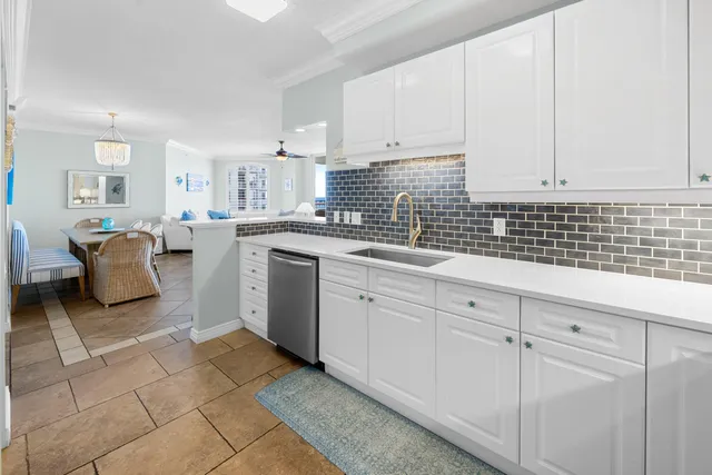 a view of a kitchen from the hallway