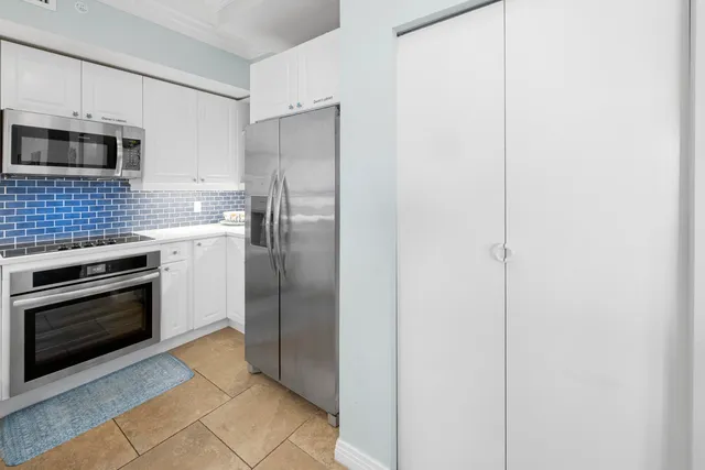 a view of hallway with wooden floor