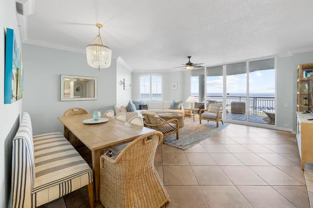 a very nice looking dining room with a table and chairs