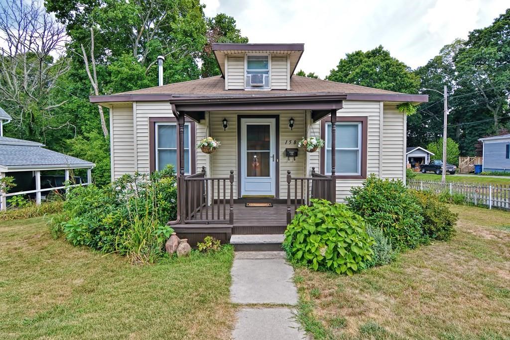 158 Union Street Randolph, MA 02368 - Photo 1 of 41 a front view of a house with garden
