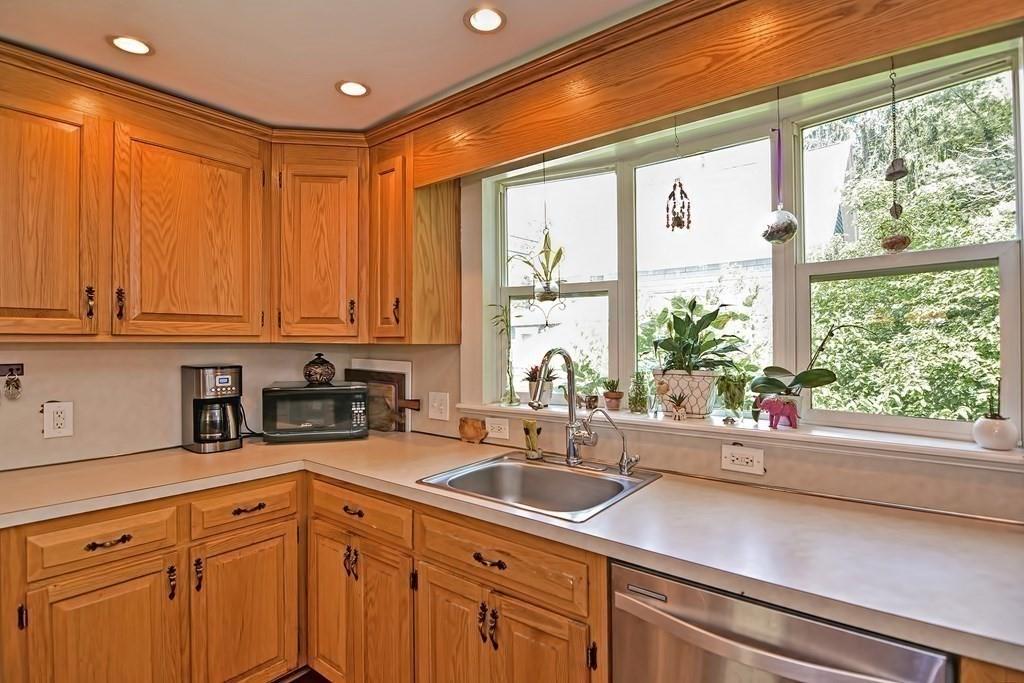 158 Union Street Randolph, MA 02368 - Photo 11 of 41 a kitchen with a sink and large window