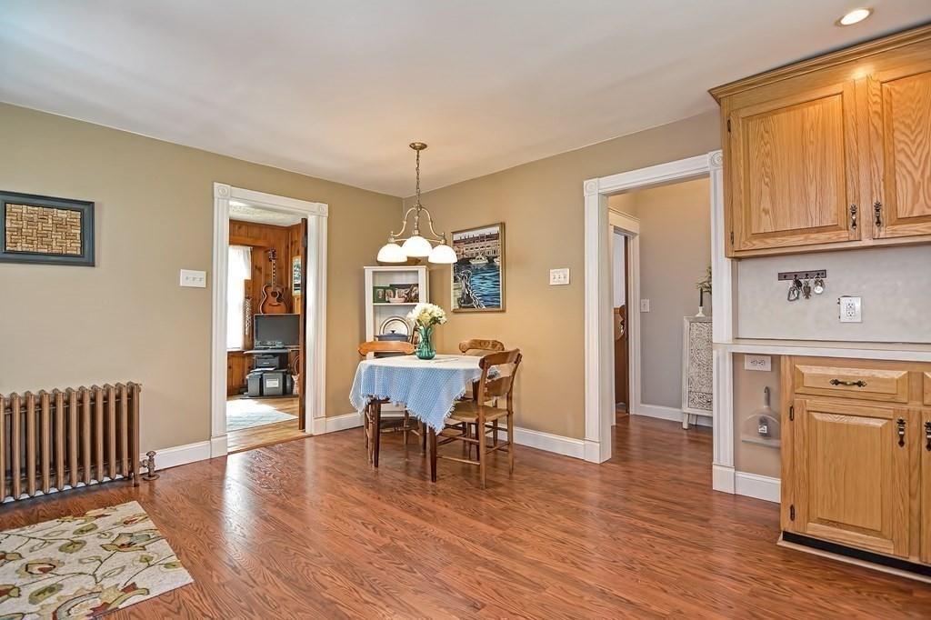 158 Union Street Randolph, MA 02368 - Photo 14 of 41 a view of a dining room with furniture window and wooden floor