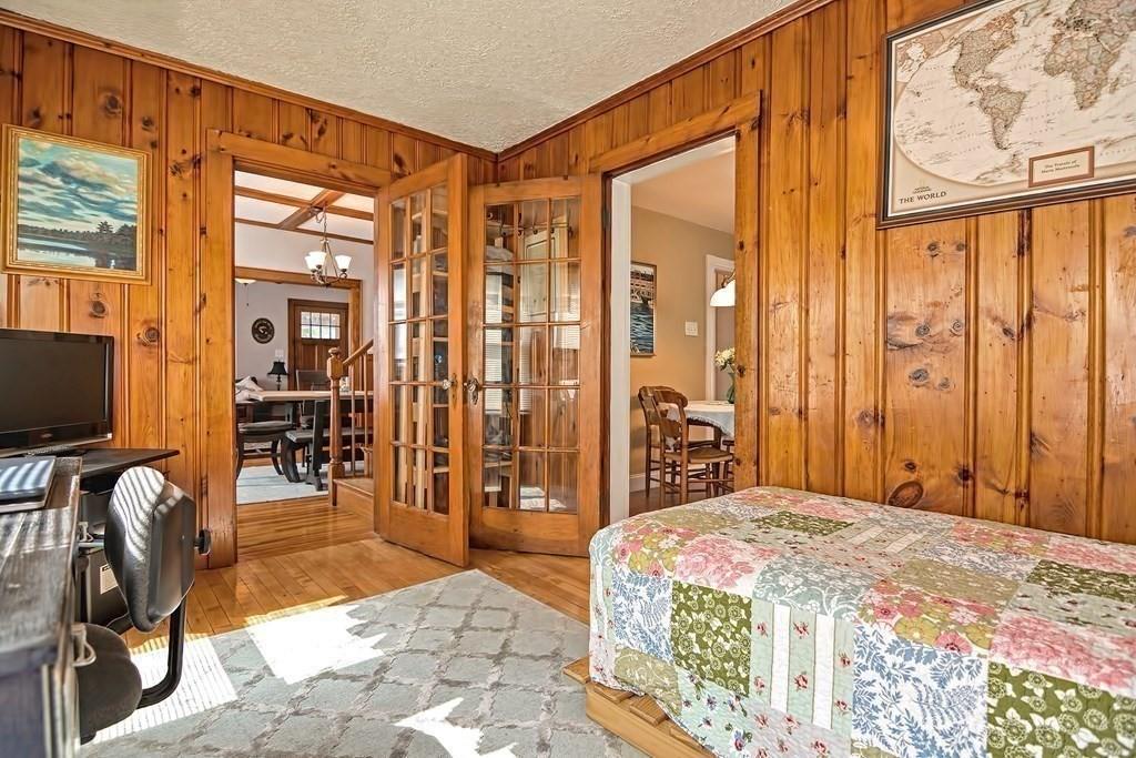 158 Union Street Randolph, MA 02368 - Photo 18 of 41 a bedroom with a bed and glass door