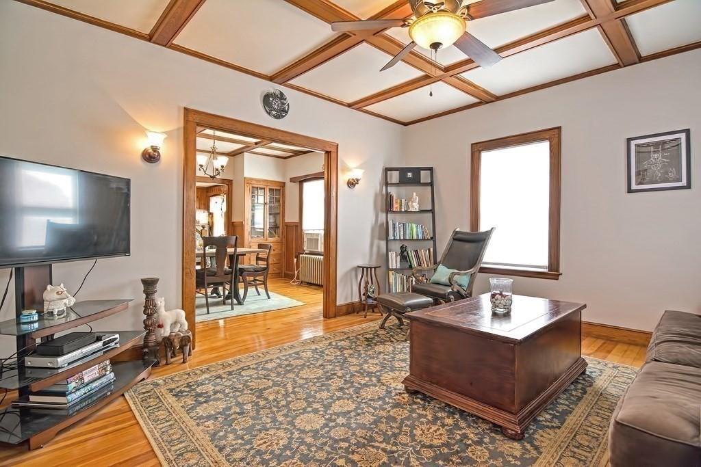 158 Union Street Randolph, MA 02368 - Photo 26 of 41 a living room with furniture and a flat screen tv