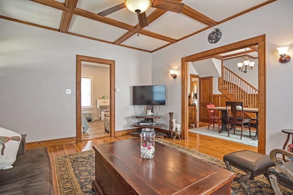 158 Union Street Randolph, MA 02368 - Photo 27 of 41 a living room with furniture and a flat screen tv