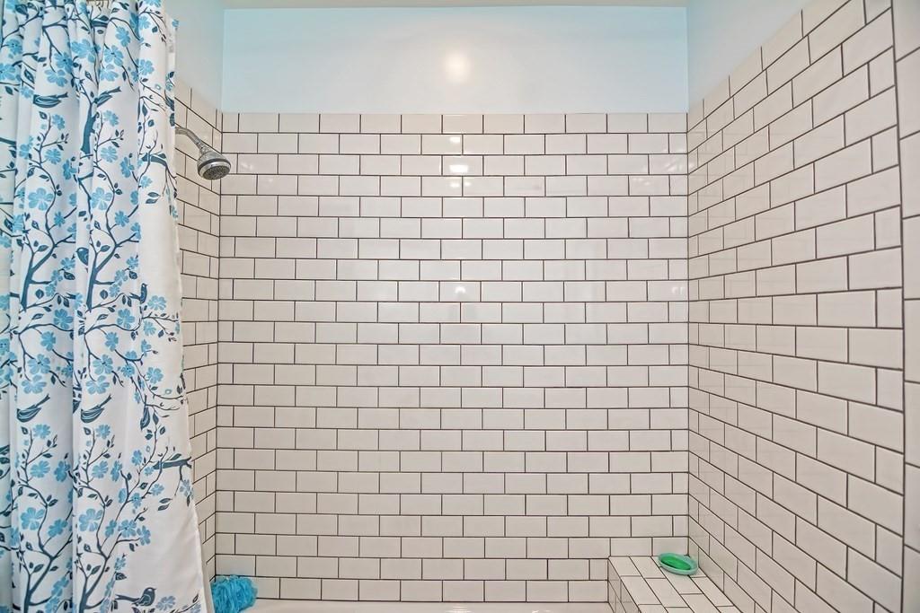 158 Union Street Randolph, MA 02368 - Photo 35 of 41 a bathroom with a shower