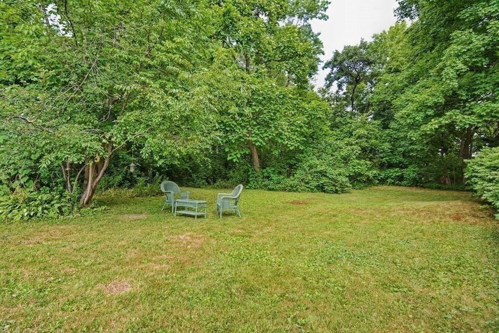 158 Union Street Randolph, MA 02368 - Photo 41 of 41 a view of a yard with a bench
