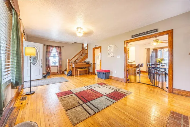 a room with patio furniture and a table