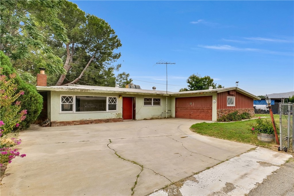 5874 Chadbourne Avenue Riverside, CA 92505 - Photo 1 of 1 a view of a house with a yard