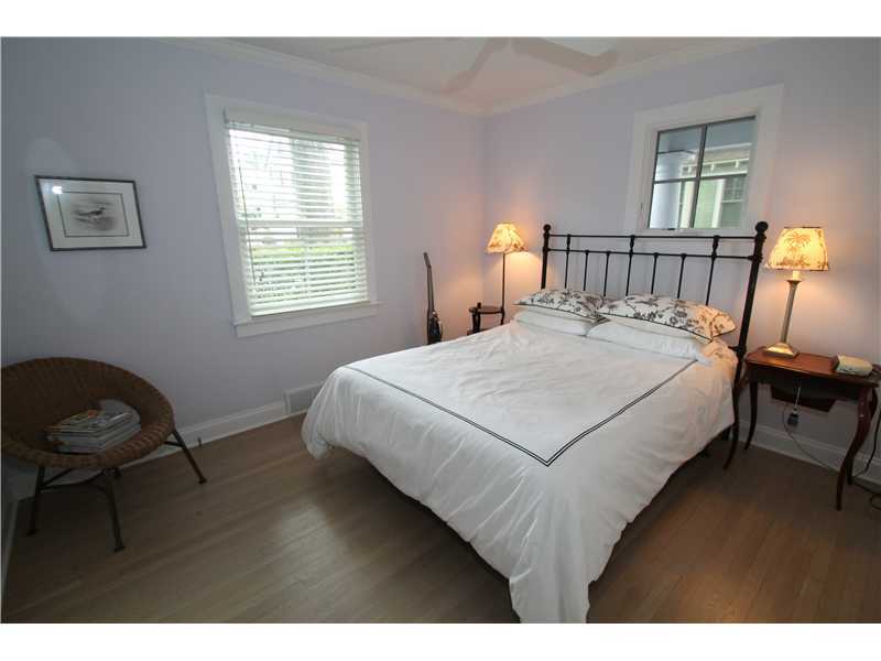 39 Pine Point Road Rowayton, CT 06853 - Photo 10 of 11 a bedroom with a bed a dresser and chair