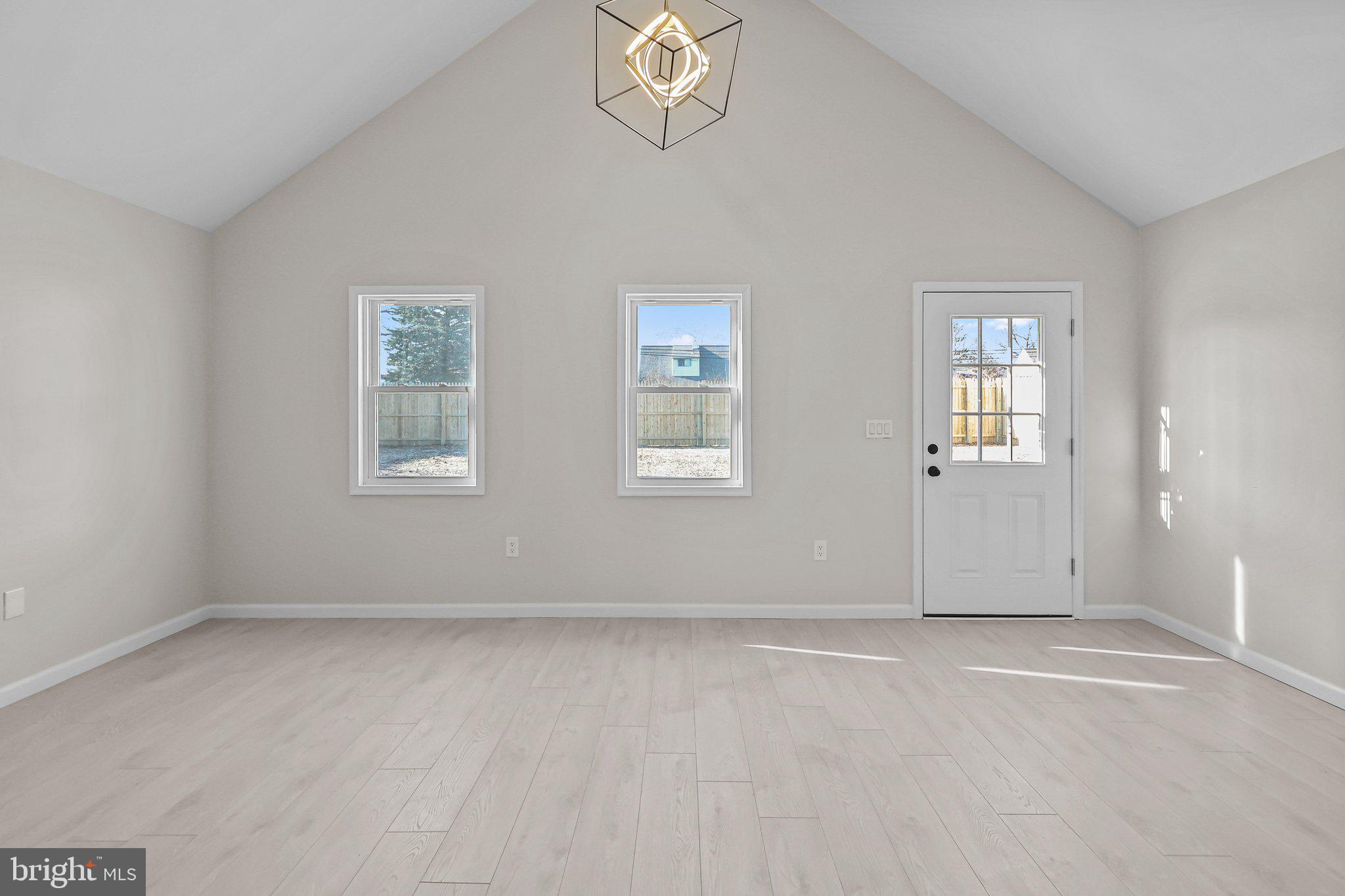 121 Goldengate Road Levittown, PA 19057 - Photo 11 of 32 a view of an empty room with a window