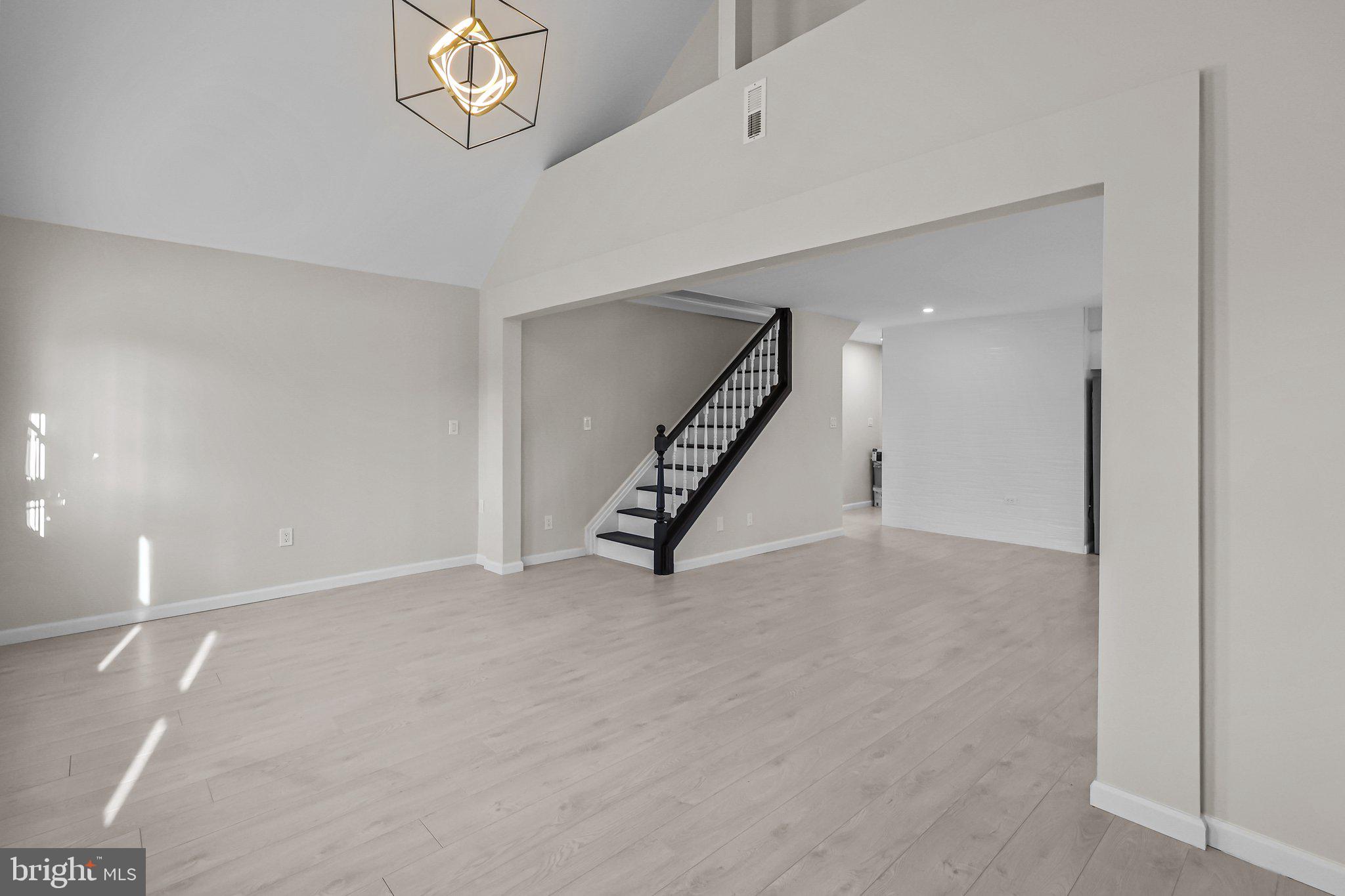 121 Goldengate Road Levittown, PA 19057 - Photo 12 of 32 a view of an empty room with stairs
