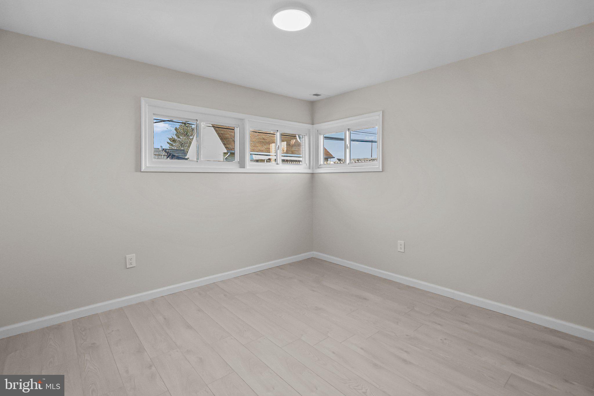 121 Goldengate Road Levittown, PA 19057 - Photo 21 of 32 wooden floor in a empty room