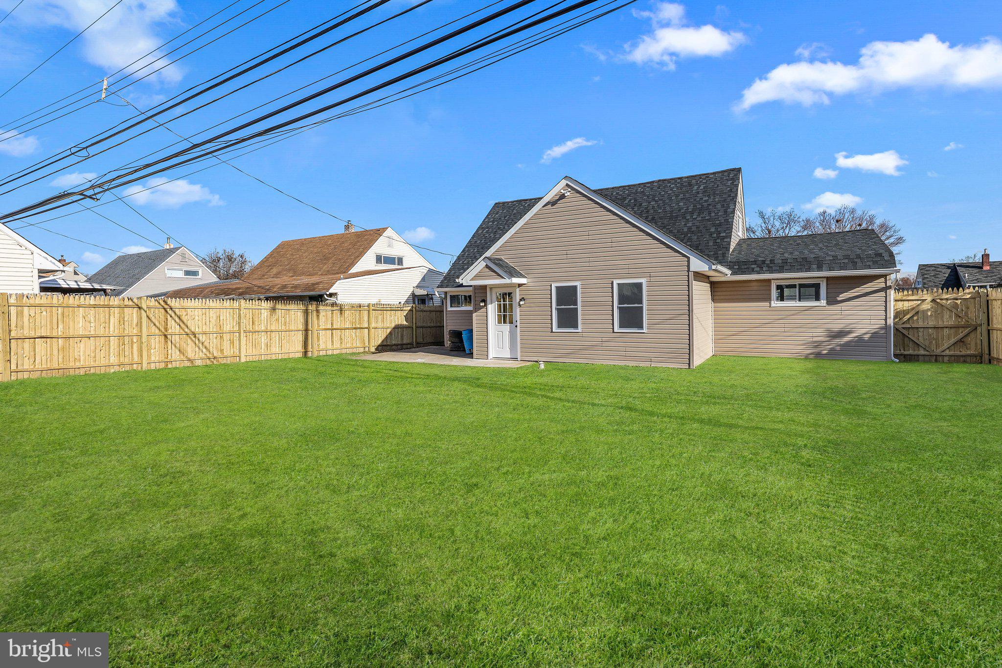 121 Goldengate Road Levittown, PA 19057 - Photo 31 of 32 a view of a house with a big yard