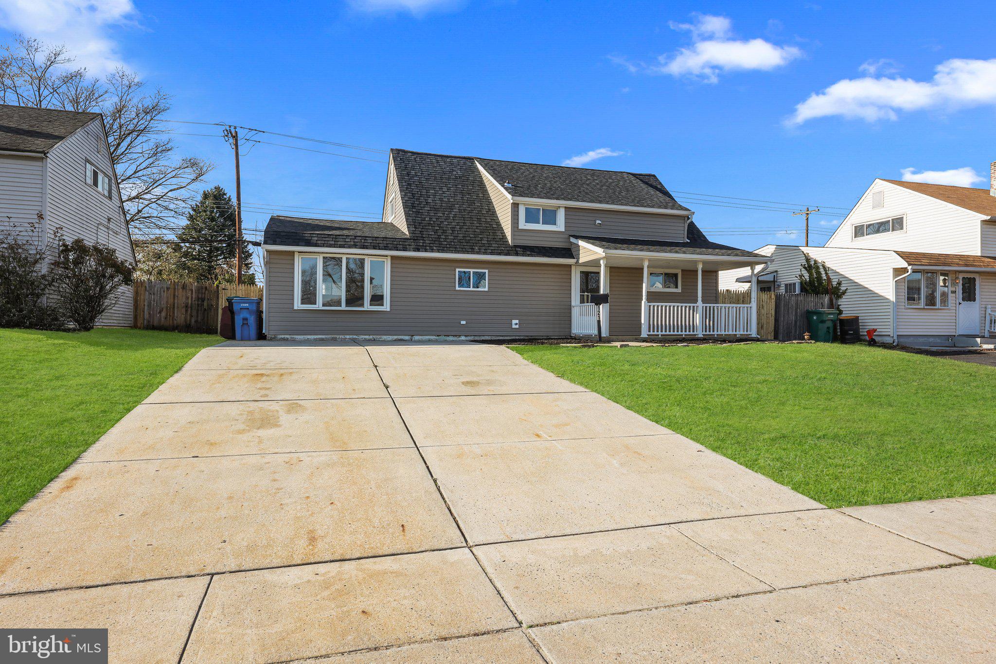 121 Goldengate Road Levittown, PA 19057 - Photo 32 of 32 a front view of a house with a yard