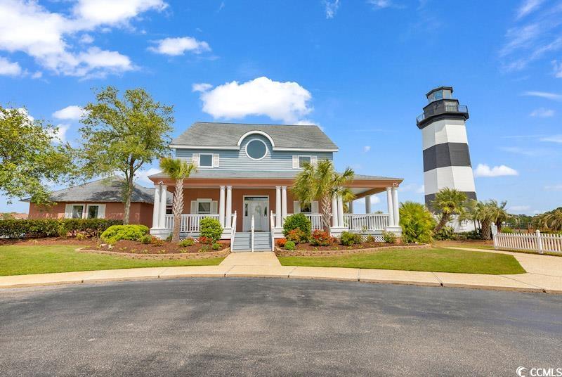 4672 Lightkeepers Way, Unit 50E Little River, SC 29566 - Photo 17 of 19 View of front of house featuring a front yard
