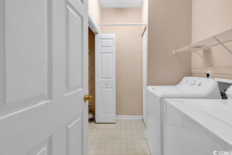 4672 Lightkeepers Way, Unit 50E Little River, SC 29566 - Photo 9 of 19 Washroom with washing machine and dryer