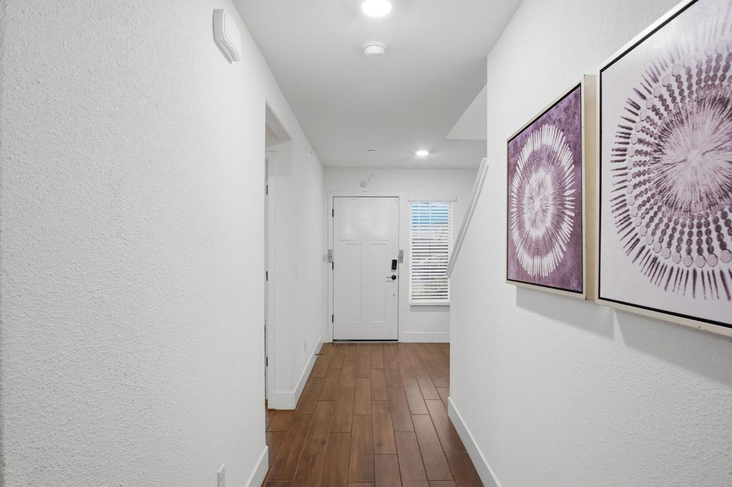 1666 Oak Street Los Banos, CA 93635 - Photo 13 of 34 a view of hallway with wooden floor