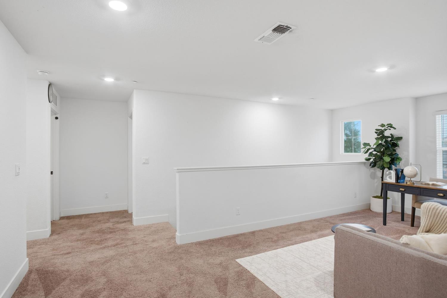 1666 Oak Street Los Banos, CA 93635 - Photo 17 of 34 a view of a livingroom with a potted plant