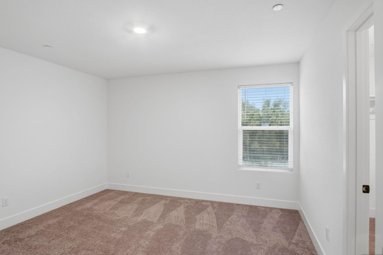 1666 Oak Street Los Banos, CA 93635 - Photo 19 of 34 an empty room with a window