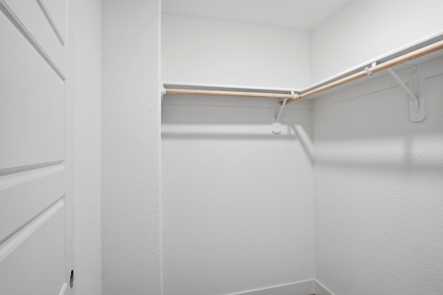 1666 Oak Street Los Banos, CA 93635 - Photo 20 of 34 a view of an empty walk in closet