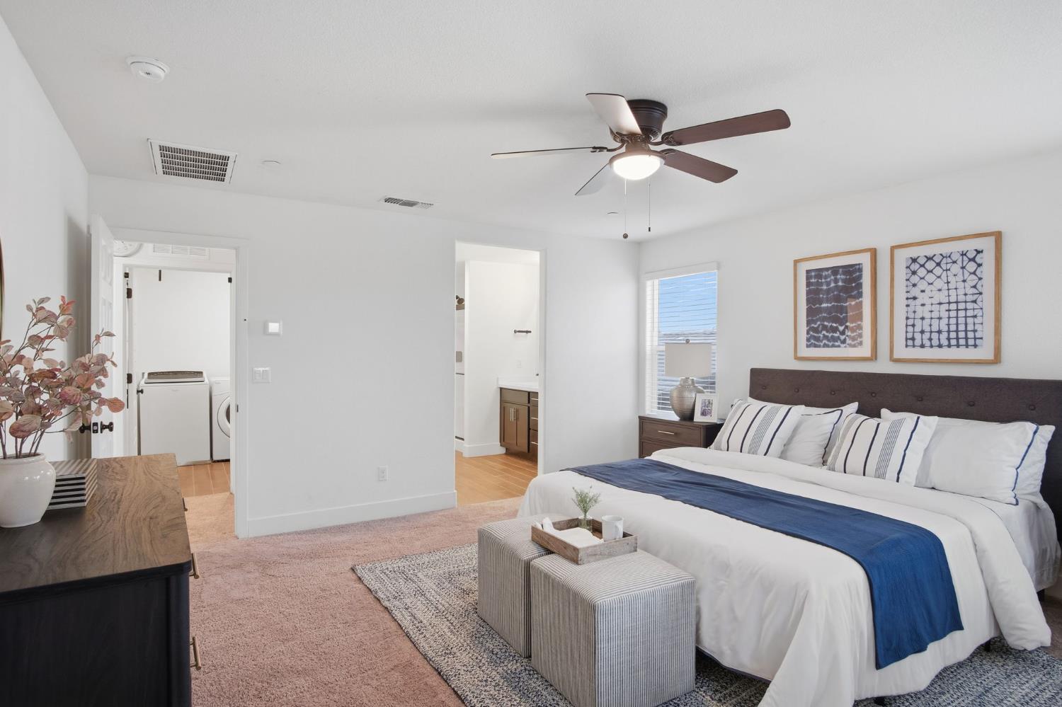 1666 Oak Street Los Banos, CA 93635 - Photo 21 of 34 a bedroom with a bed and a table