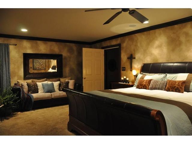 1550 Scout Road Blue Ridge, VA 24064 - Photo 13 of 52 a bedroom with a bed and a couch