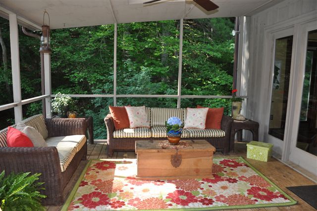 1550 Scout Road Blue Ridge, VA 24064 - Photo 19 of 52 a roof deck with couches and wooden floor