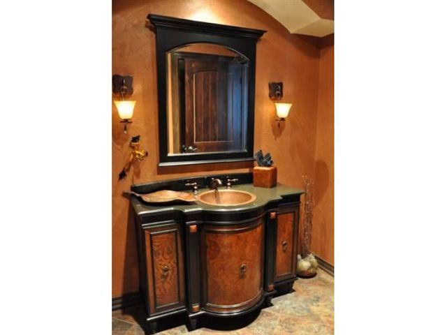 1550 Scout Road Blue Ridge, VA 24064 - Photo 25 of 52 a bathroom with a sink and a mirror