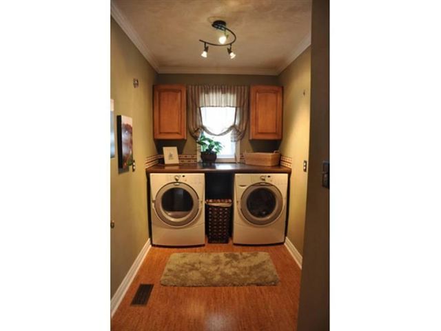 1550 Scout Road Blue Ridge, VA 24064 - Photo 26 of 52 a view of a hallway with washer and dryer