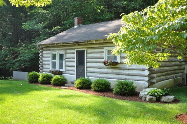 1550 Scout Road Blue Ridge, VA 24064 - Photo 30 of 52 a front view of a house with a yard