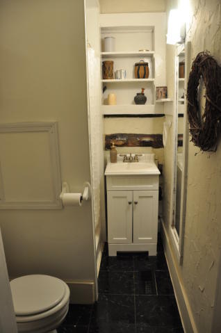 1550 Scout Road Blue Ridge, VA 24064 - Photo 35 of 52 a bathroom with a toilet and a sink