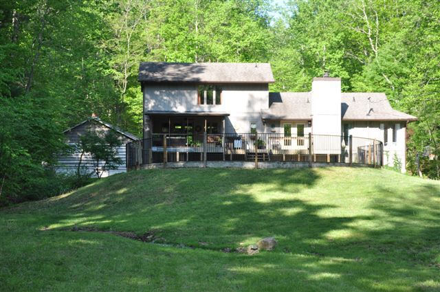 1550 Scout Road Blue Ridge, VA 24064 - Photo 8 of 52 a view of a house with a yard porch and sitting area