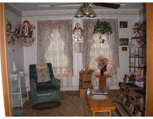 81 Main Street Stratton, ME 04982 - Photo 5 of 13 Living Room. Cozy living room.