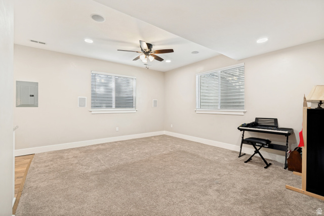 332 South 500 West Payson, UT 84651 - Photo 31 of 50 Carpeted tv room featuring two windows with horizontal blinds, a ceiling fan with integrated lighting