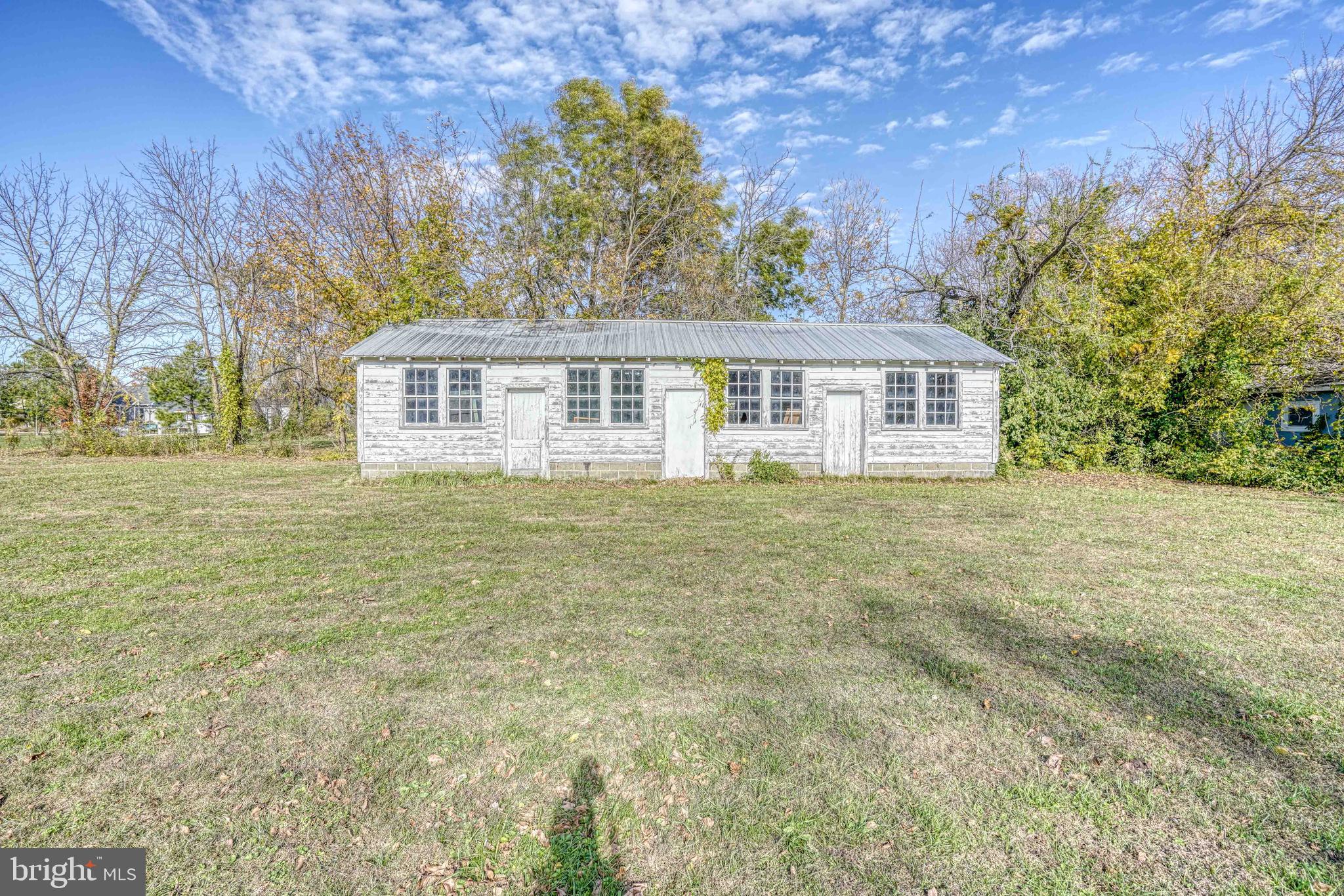 21486 Mission Road Tilghman, MD 21671 - Photo 22 of 32 a house view with garden space